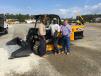 (L-R): Charlie Murphy, Julius Lybrand and Kenny Bickley, all of Mid-Carolina Electric Cooperative in Lexington, like the ease of access into the cab of the JCB compact track loaders.
