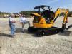 Billy Wall (R), Company Wrench, goes over the JCB 8040 ZTS excavator with Donald Taylor of Taylor Brothers in Columbia, S.C.
