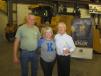(L-R): Dewain and Sara Gipson of Gipson Farms LLC enjoy the open house with Bob Erb, chairman of Erb Equipment Company. 
