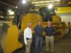 (L-R): Gregg Erb, president and director of sales, Erb Equipment Company; Philip Hamby, Hamby Construction Inc.; and Jeremy Futrell, Erb Equipment Company, stand in front of the John Deere 1050K dozer on display at the open house. 
