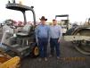Frank Dalmolin (L) and his son, Frankie, of 5D Mining and Construction in Globe, Ariz., browse the yard.
