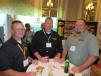 (L-R): Aaron Mittendorf, Jeff Dress and Mike Cullen, all of Ohio CAT, enjoy the OAIMA reception.