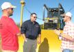 (L-R): Adam Stubblefield, AHS Construction, Pontotoc, Miss.; Bruce Thomas, Thompson Machinery; and Don Kelly Stewart, Eutaw Construction, Aberdeen, Miss., talk about the Cat D6K2 dozer with grade control and add on Accugrade system. 
 