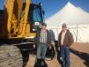 Gerardo Locusen (L) and Peter Franz came from Chihuahua, Mexico, to bid on the Cat 330B excavator pictured here. Locusen operates DGA Transport, a heavy equipment transport company.
