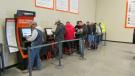 The cold wind drove many folks inside to use the Timed Auction facilities — and many more were lined up waiting. 
