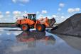 The Doosan DL250-3 wheel loader moved raw materials eight to 15 hours a day, six days a week.

