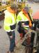 Keaton (L) and C.K. Hanks, both of Hanks Directional, Auburn, Ky., test this Ditch Witch JT2020 directional drill. 
