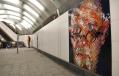In this Dec. 22, 2016 file photo, mosaics by artist Chuck Close adorn the walls of the new 86th Street subway station on the Second Avenue line in New York. Passengers began riding the new line on Sunday, Jan. 1, 2017. (AP Photo/Seth Wenig)