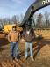 Chad Martin (L) and Kent Coble, both of Coble Sandrock in Libery, N.C., look for an excavator for an upcoming project. 