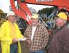 (L-R): Danny Gibbs, Bowden, Ga.; Charles Turner, Heflin, Ala.; and Terry Shealy, Tallapoosa, Ga., share a laugh before the auction 