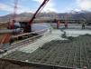 Once the Geofoam embankment was built, a concrete load distribution slab was poured directly on top of the Geofoam. 
