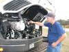 Inspecting a Bobcat E85 mini-excavator is Kerry Abramson of KGM Contractors, Angora, Minn. 