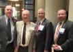 (L-R): Steve Huffman, Ohio state representative, District 80; Dennis Garrison of Melvin Stone Company; Pat Jacomet, OAIMA executive director; and Wes Retherford, Ohio state representative, District 51, caught up at the reception. 