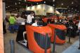 ConExpo guests try out the Ditch Witch virtual reality simulator. 