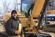 Robert Knopik of Little Falls, Minn. — pictured in front of the selection of excavators and mini-excavators featured in Ring 1. 