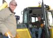 Jimmy (L) and his brother, Ellis Cofield, independent contractors based in Eastman, Ga., check out a Komatsu D65WX dozer 