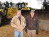 Scott Crowe (L) of Crowe Equipment, Jasonville, Ind., and Wally Sexton of Sexton Equipment Inc. based in Santa Claus, Ind., consider bidding on this Cat D8T dozers. 