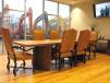 A rustic conference room overlooks the equipment yard and provides a space for quiet meetings. 