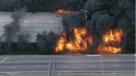 Flames erupt from the underpass on Interstate 85 on Thursday, March 30. Photo via NBC News Channel. 