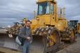 Jeremy Monjure of SW Construction Parts in Albuquerque, N.M., checks out the Cat 825C compactor, vintage late ’80s. 