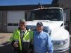 Rich Newman (L), retiree of Musson Brothers Inc., enjoys the open house with Dean Adsit, used equipment sales, Nortrax. 