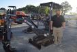 Brian Smith of NextLot Auction makes sure this Terex mini-excavator was ready to go. 