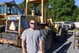 Troy Boutwell of APT, Brooksville, Fla.,considers bidding on this Komatsu WA180 wheel loader. 
