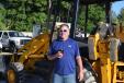 Glen Stocker of American Diesel & Hydraulics, Dunnellon, Fla., shows interest in this JCB backhoe at the auction. 