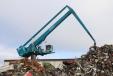 The Sennebogen 8130 EQ loads 20,000 metric tons of scrap per month into a large stationary shear.