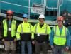 (L-R): AGGCORP’s Roberto Armbruster discusses new Powerscreen equipment with Tim Perrin, Dan King and Mark Perrin, all of PK Crushing.