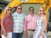 (L-R):?Gayle and Tommy Triplett of Triplett Land Clearing, Rincon, Ga., receive a warm welcome from Chris and Jessica Shea, Low Country JCB 