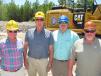 (L-R) are John Gorham and John McLean, Yancey Bros. Co. sales representatives; Shawn Greenway, Vulcan Materials, Norcross, Ga., plant manager; and Mike Turner, owner, Rockmonster.us.