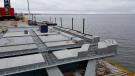 An Exodermic deck is comprised of a reinforced concrete slab on top of, and composite with, an unfilled steel grid.