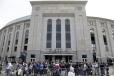 Outside Yankee Stadium, fans congregate for one of the best-known professional sports rivalries. The Red Sox/Yankees series is one of the most captivating sporting events in Major League Baseball.