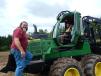 Brent Wilke (L) of Low Profile Logging, Tomahawk, Wis., checks out the John Deere 1210 logging forwarder with help from Jimmy Mylchreest, Nortrax forestry training instructor.
