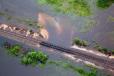 BNSF track is washed out Aug. 29 near F.M. 787 northeast of Cleveland, Texas, due to flooding caused by Harvey.
(BNSF photo)