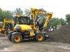 Mike Tome, a road crew member of London Grove Township, test drives a JCB Hydradig.