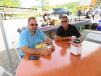Todd Lynch (L) and John Basham, both of United Contractors Midwest, enjoy lunch at the event.
 
