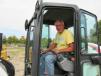 Stu Cooke of Cooke Excavating in New London, Ohio, considers a bid on this Bobcat E50 mini-excavator