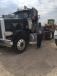 Frank Rempel, of Seminole, Texas, with a 2009 Peterbilt 388 day-cab truck tractor that sold in the Sept. 13 auction.
 