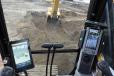 Seen on the right is the Caterpillar 2-D CGC screen and the Trimble 3-D Earthworks TD520 on the left. 