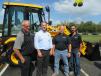 (L-R): JCB factory representatives Farrin Barber, Jim Blower and Clay Durham join Company Wrench’s Tony Little to answer question about the many JCB machines on display at the event.
 