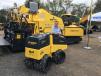 Dave Dennison of Bomag with a few of the company’s top selling machines: the Bomag BMP 8500 trench roller and the Bomag CR562 asphalt paver.
