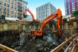 The Hitachi excavators can break down rock before digging starts, which cuts down on the need for blasting and is critical for tight city jobs.