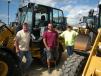 (L-R): Mike Stine, Kevin Martin and Jeff Layton, all of Love Point Ventures, Stevensville, Md., purchased this Cat 908 H2 at the Alban Cat-A-Thon.