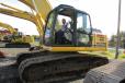 Patrick Beame, equipment buyer, Milam’s Equipment Sales, starts up this SK210 excavator before placing a bid.  