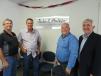 (L-R) are Bill  Ewan,  The Victor L. Phillips Company salesman; Dane Braden, owner of Explosive Contractors Inc.; Randy Wacker,  The Victor L. Phillips Company vice president of sales and marketing; and Maurice Hunter, Atlas Copco business line manager, surface and exploration drilling equipment. 
 