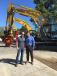 Brad Hutchinson (L), founder and owner of Company Wrench, welcomes Pete Morita, vice president, excavator division of Kobelco.
