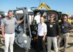 JCB and Loftness team up to showcase their products. (L-R) are Blake Eavenson of Loftness; Ashby Graham, JCB regional sales manager; and from MacKinnon JCB, Neil Rountree, Tifton, Ga., branch, and John Miller, Jacksonville, Fla., branch. 
 