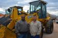 Alpha and Omega Contract Sales and Consulting CEO Jackie Johnson (L) and Hugo Hernandez were among the bidders on this John Deere 544H loader. 